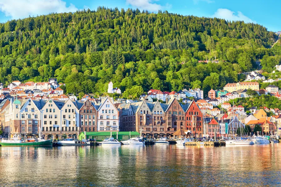 A long row of old buildings seen from the seaside