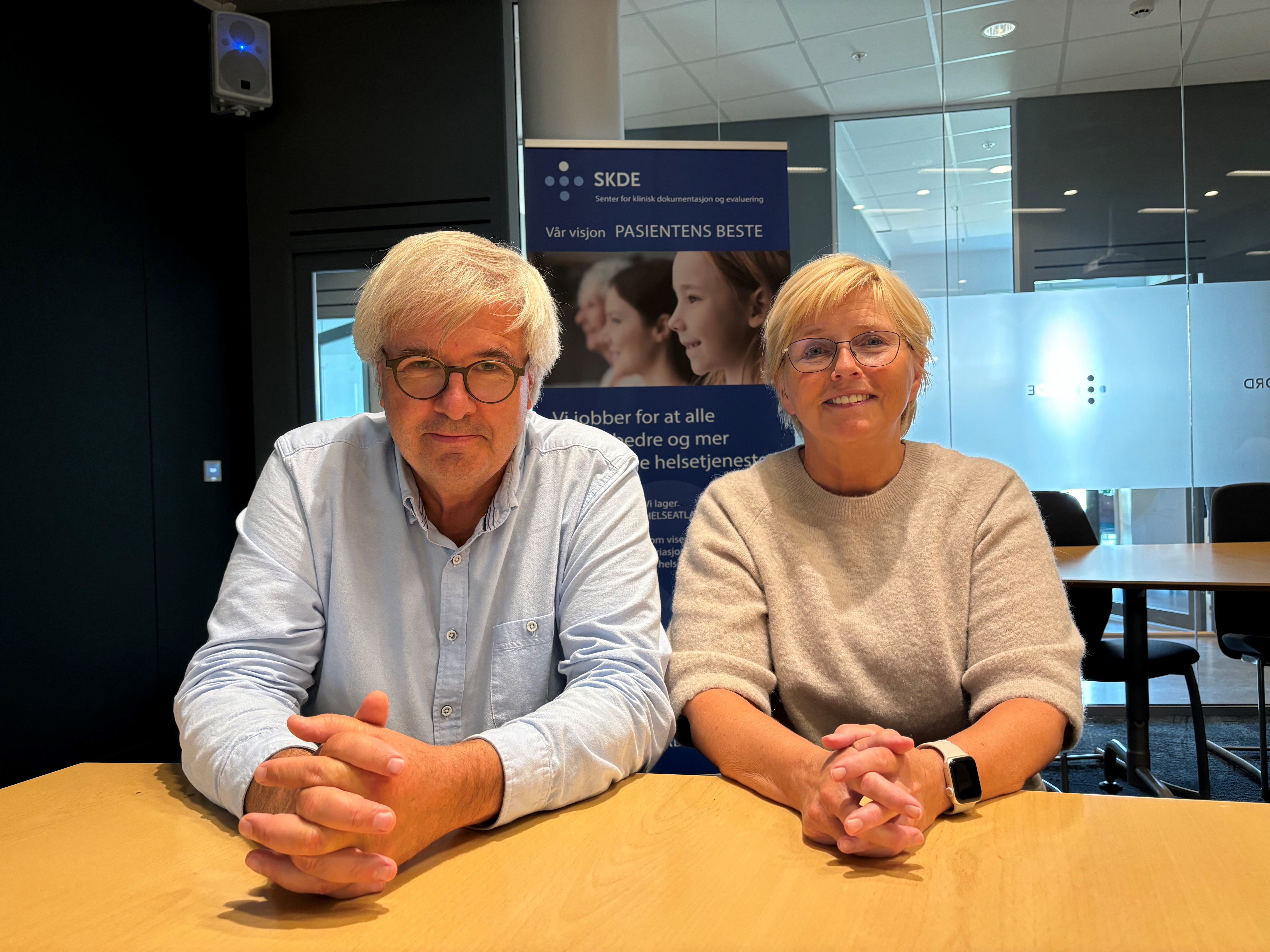 A man and a woman sitting at a table