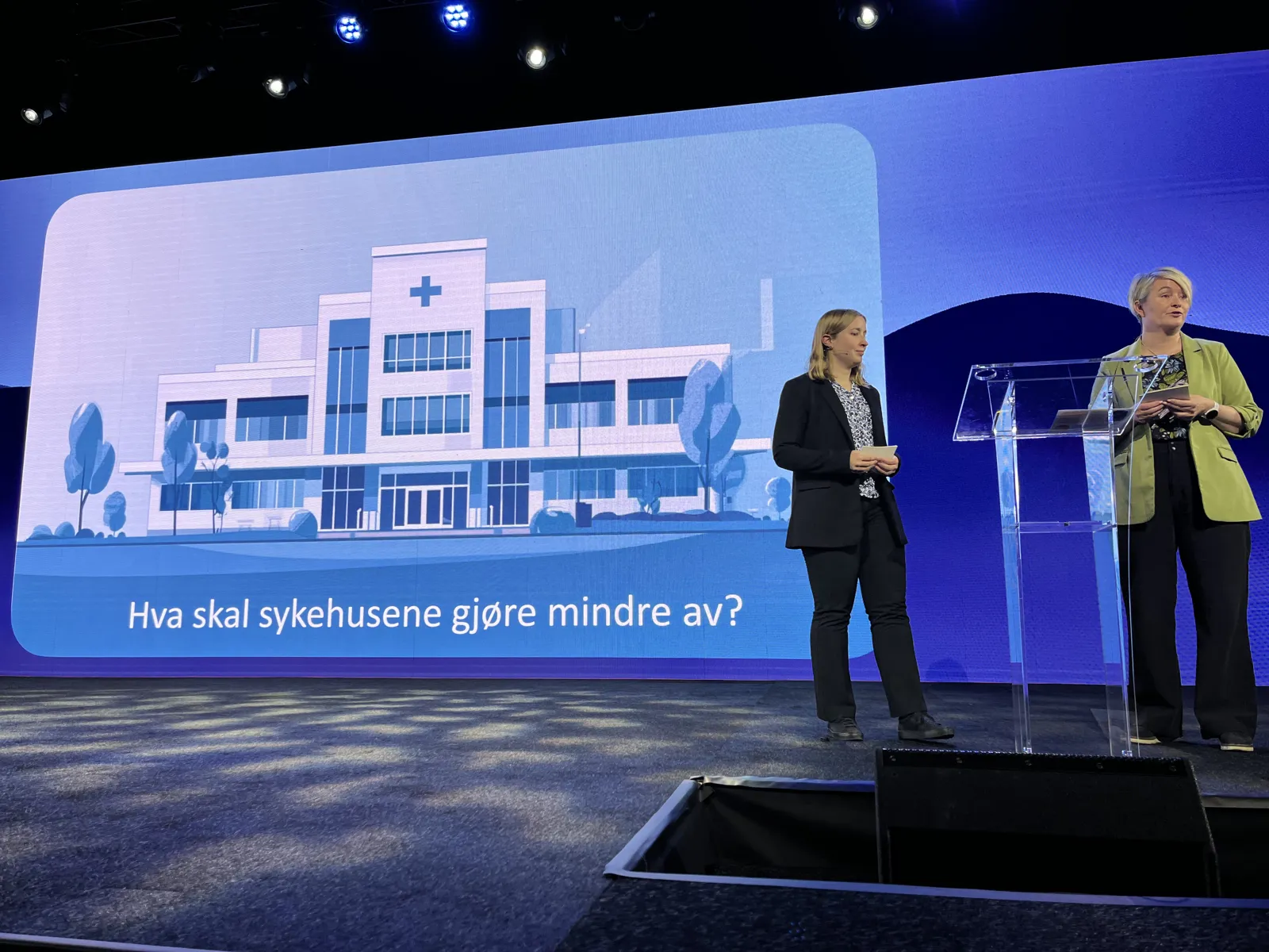 A couple of women on a stage