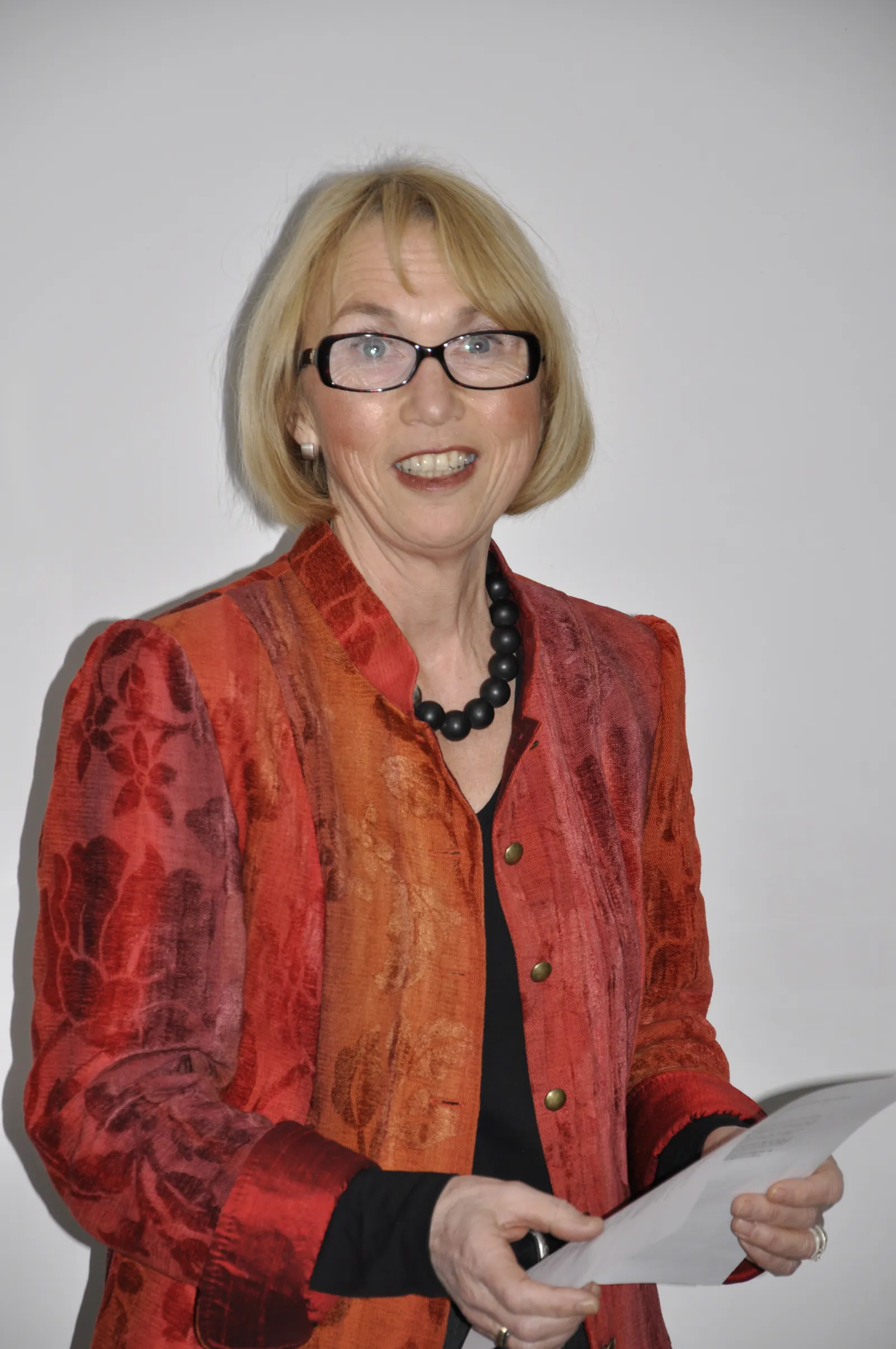 A person holding a piece of paper