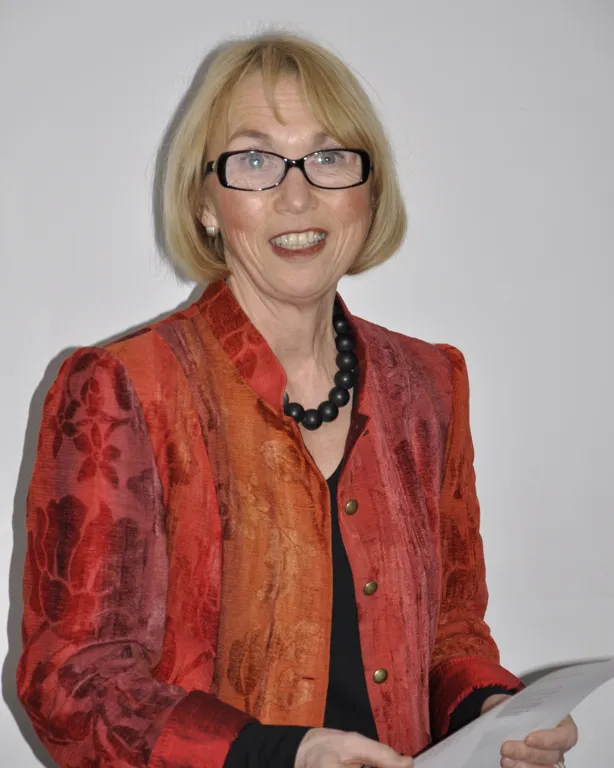 A person holding a piece of paper