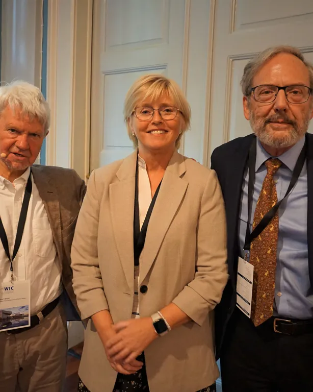 A few people standing together