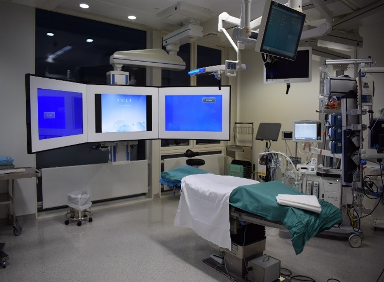 A hospital room with medical equipment