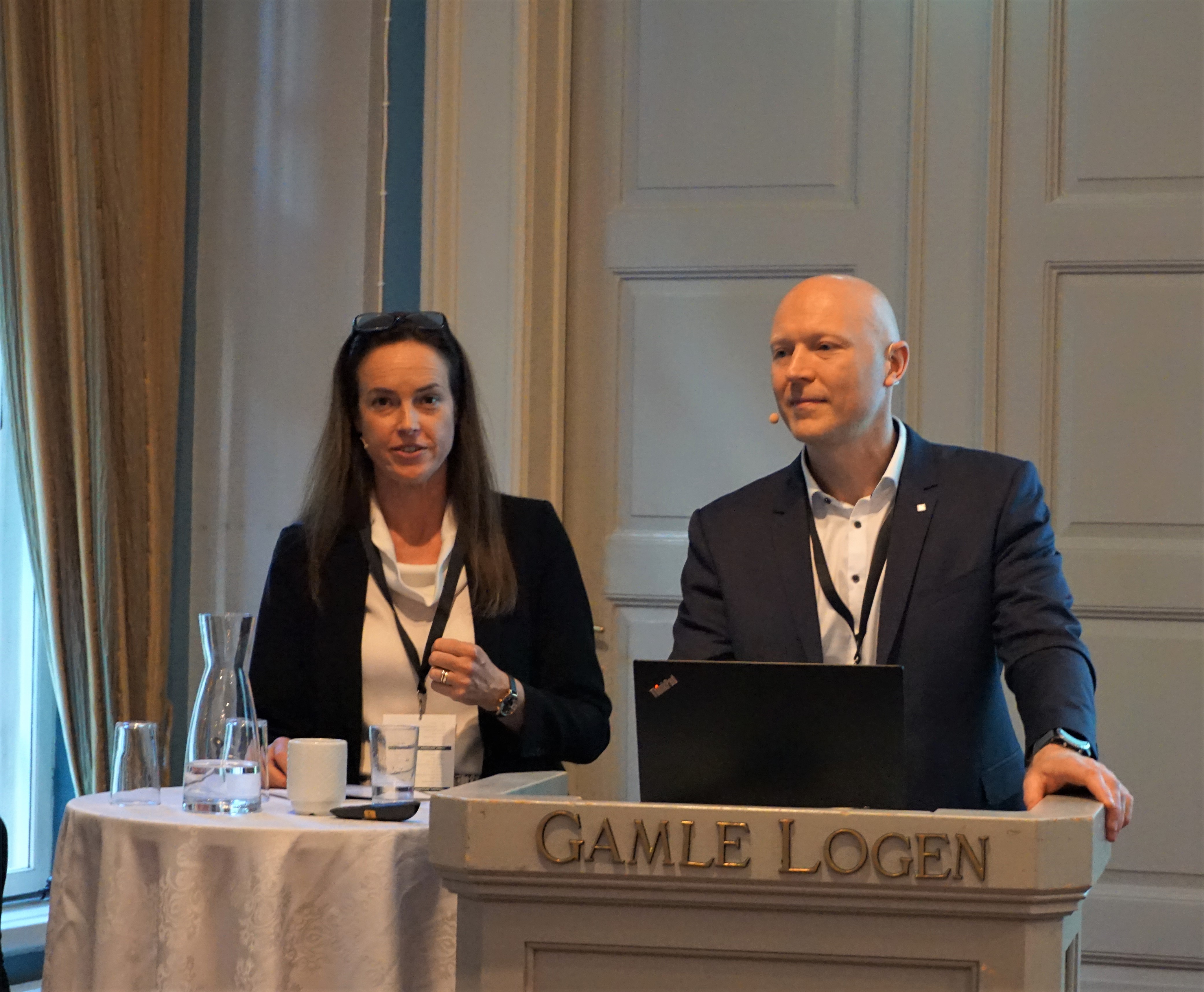 A man and a woman sitting at a table
