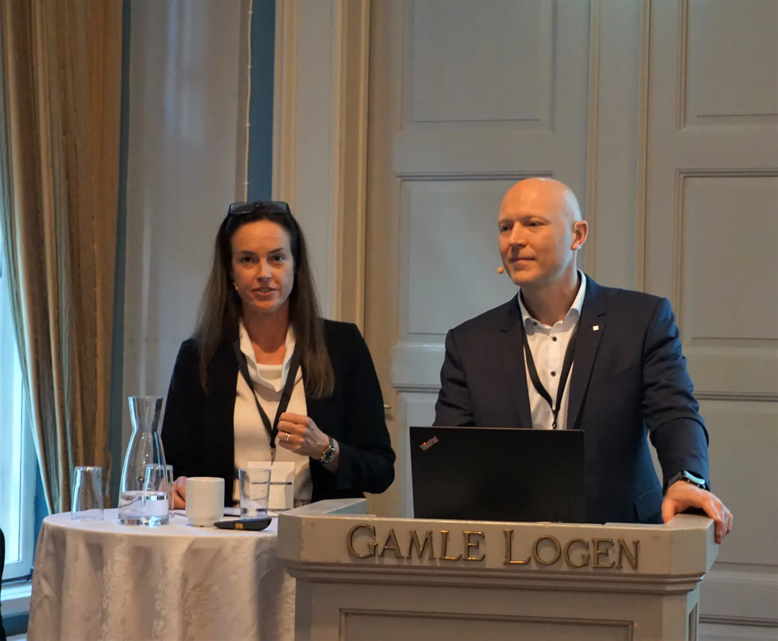 A man and a woman sitting at a table