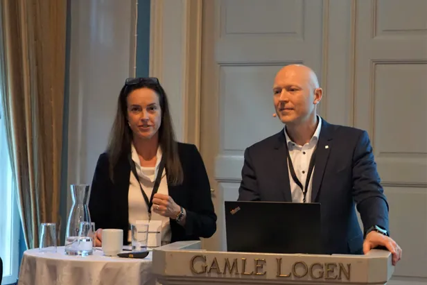 A man and a woman sitting at a table