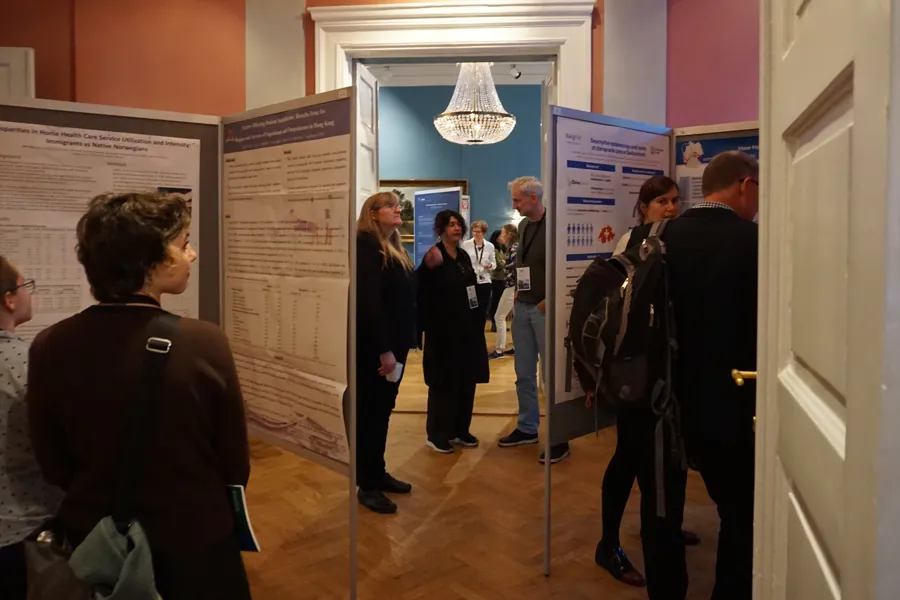 A group of people standing in a room