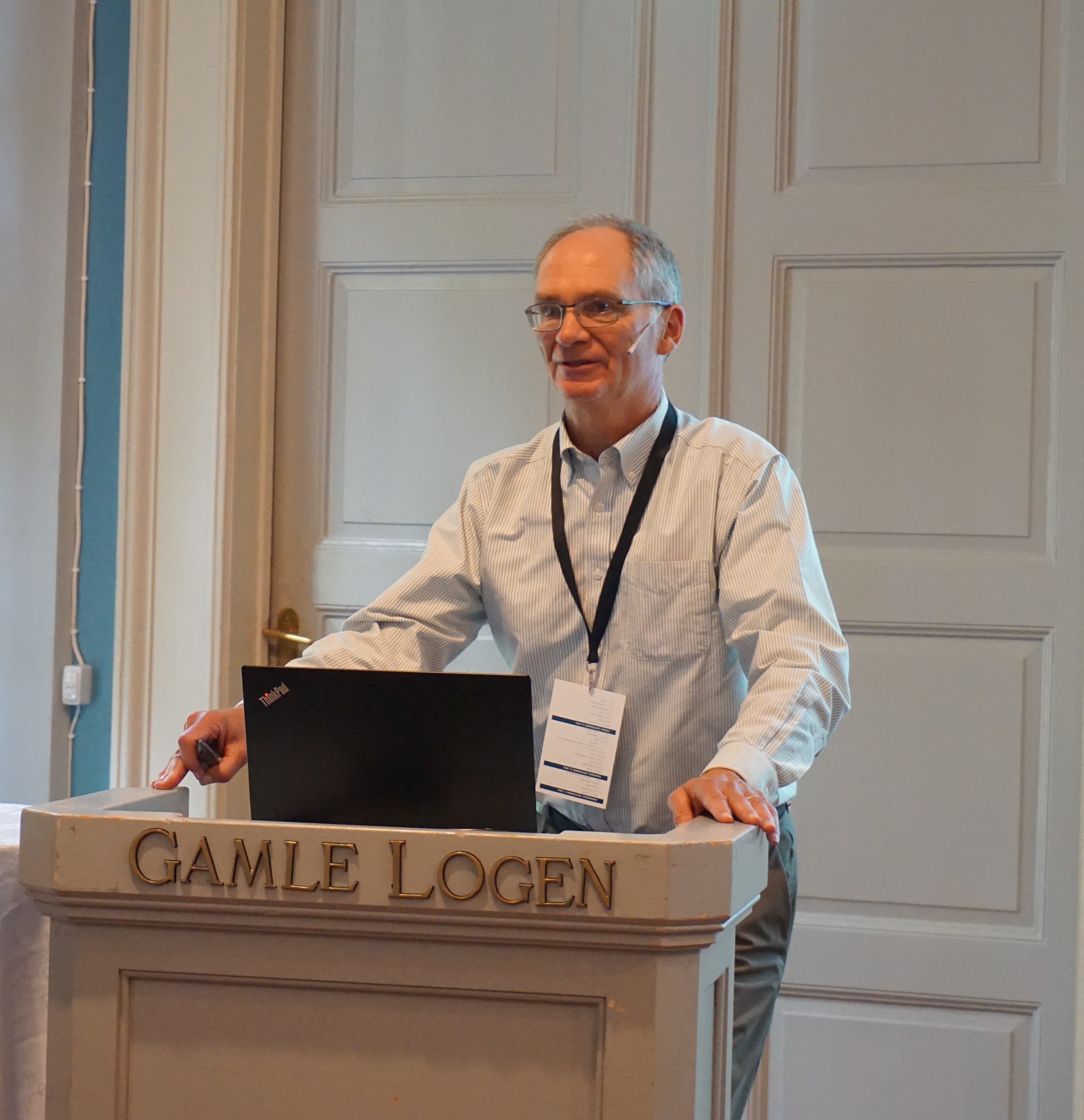 A man standing at a podium