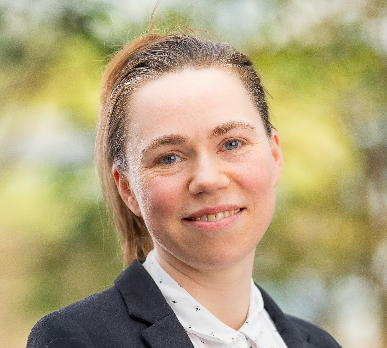 A close-up of a man smiling