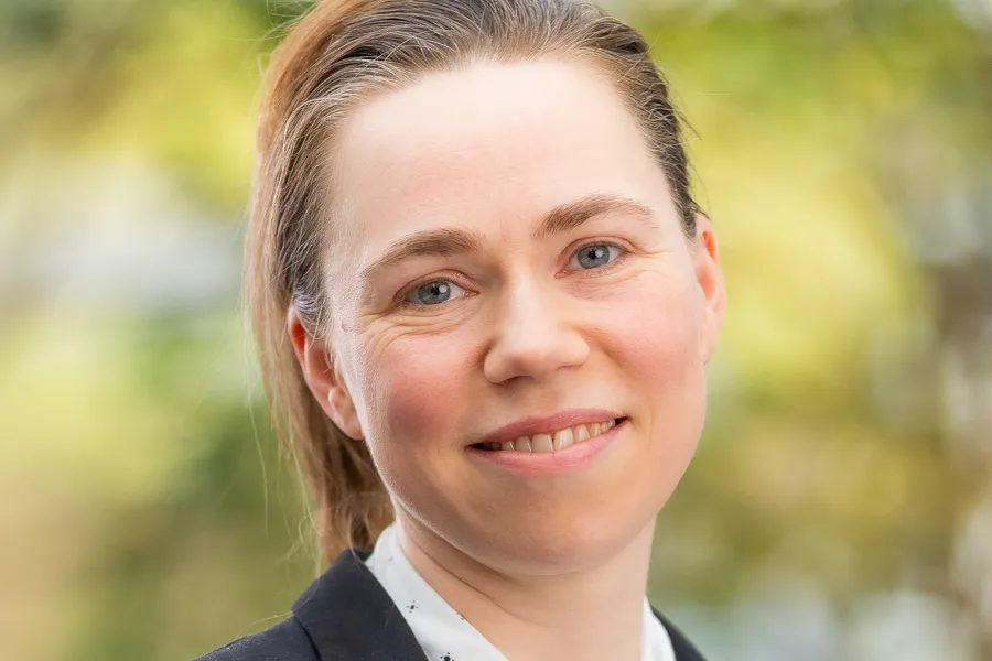 A close-up of a man smiling