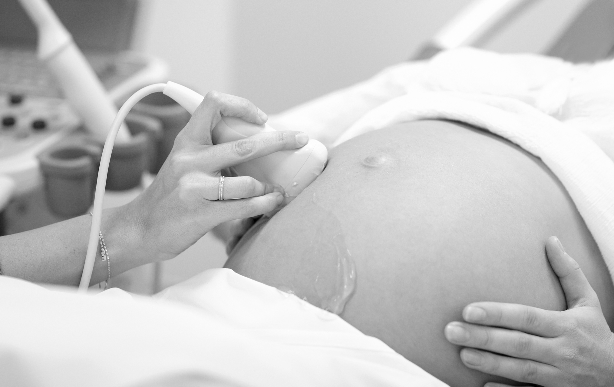 A doctor attending to a pregnant patient