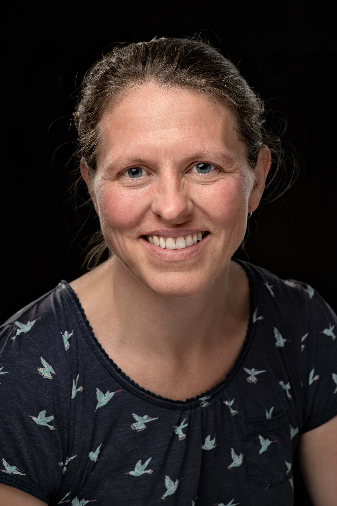 A person smiling for the camera