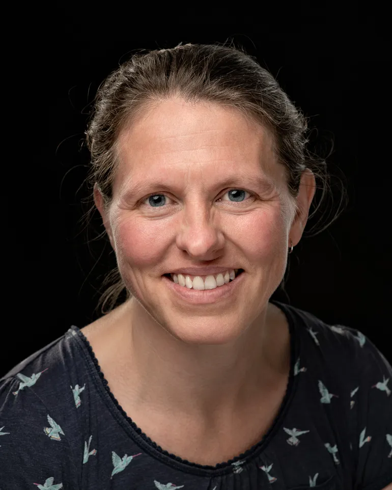 A person smiling for the camera