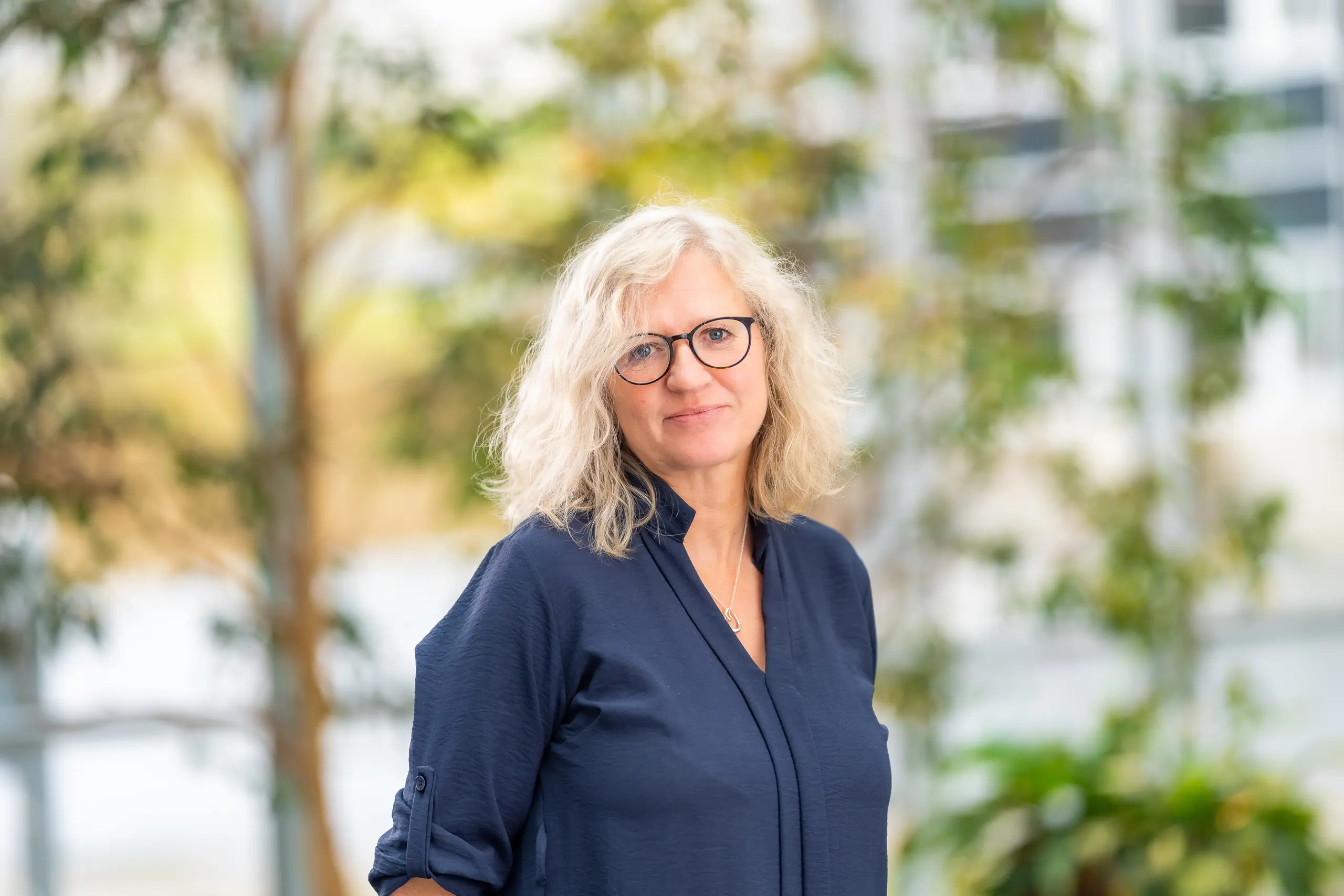 A woman wearing glasses